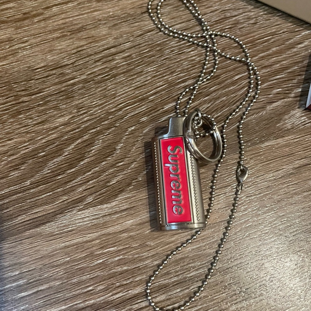 Supreme Red and Silver Phone Charm